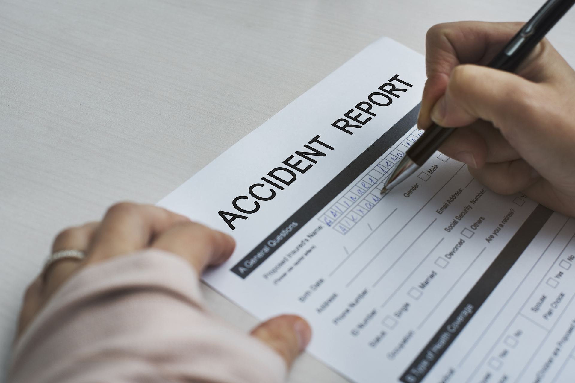 Filling out accident report form Filling out accident report form
