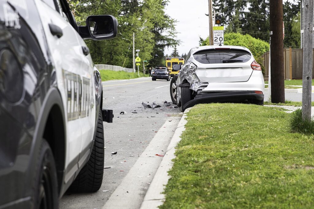 sheriff investigates car crash on the street